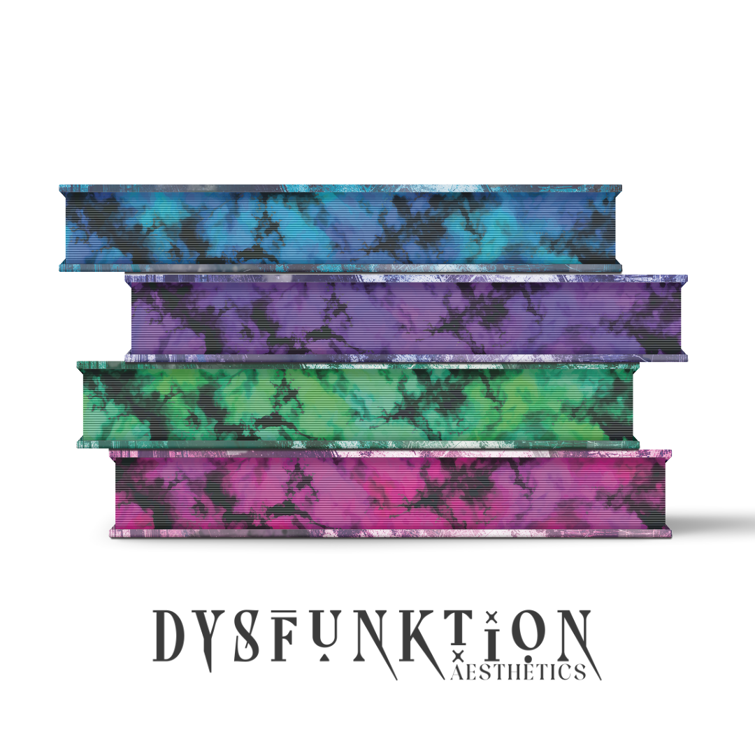 Book stack showing decorative edge design developed as part of the overall book concept.