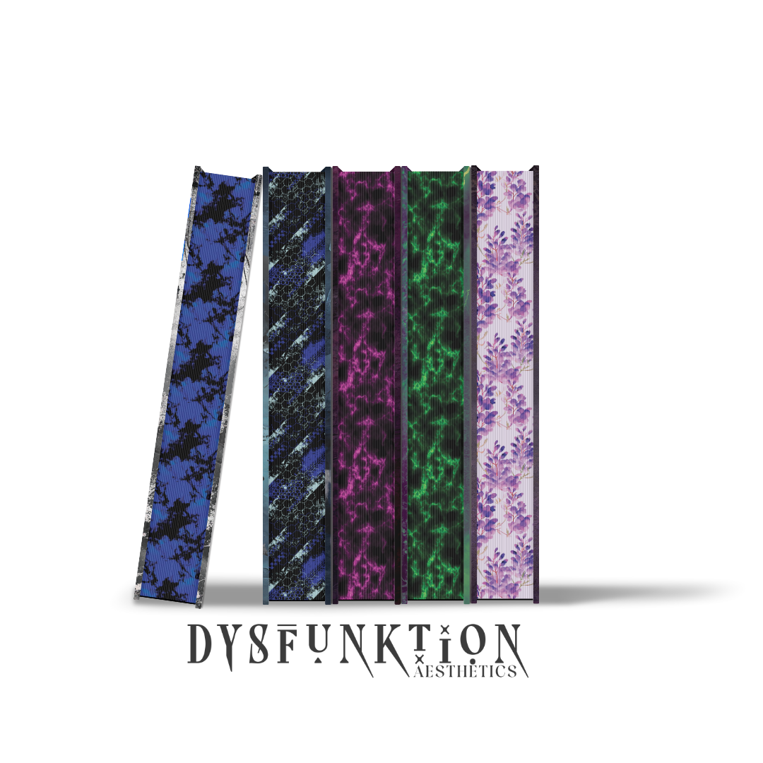 Book stack showing decorative edge design developed as part of the overall book concept.